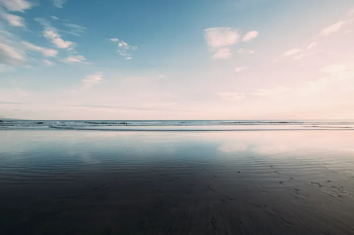 Wide flat beach at low tide on the Pacific coast